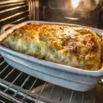 How do you reheat chicken cobbler in the oven